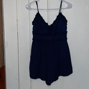 Size small blue woman’s romper from Francesca’s.